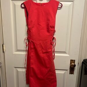 Calvin Klein coral dress with corset ties on each side. Women’s size 8